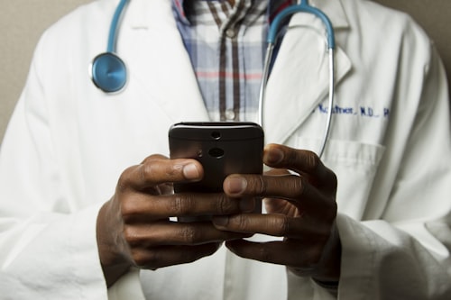 Physician reviewing a patient treatment plan at J9 Clinic in Houston